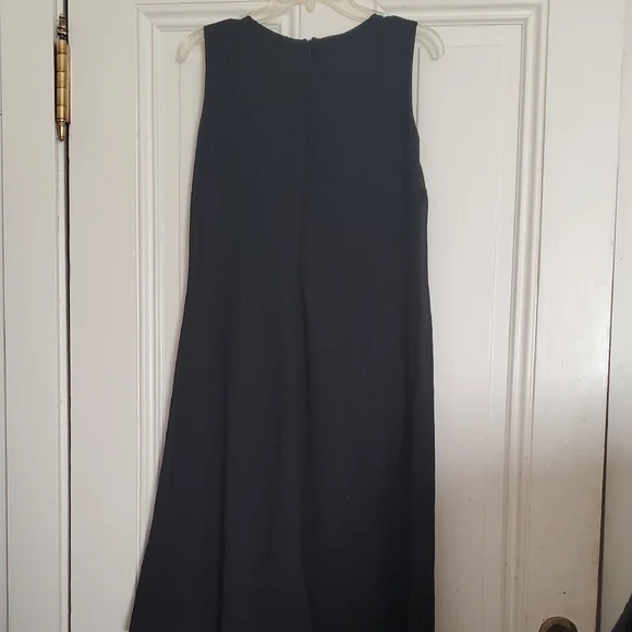 Ursula of Switzerland Elegant Black Sleeveless Dress with Plisse Patel in Front